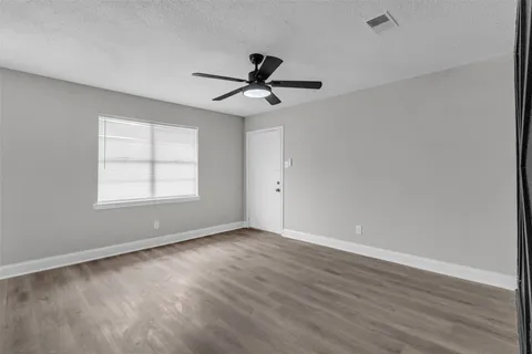 a kitchen with stainless steel appliances a refrigerator sink and cabinets