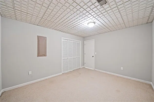 en empty room with windows