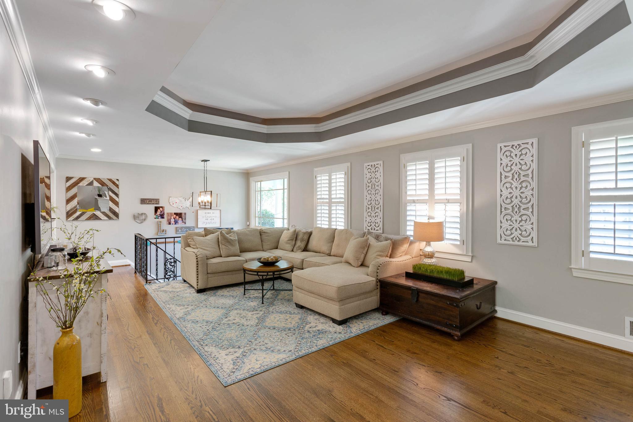 Living Room w/ Lighted Trey Ceiling