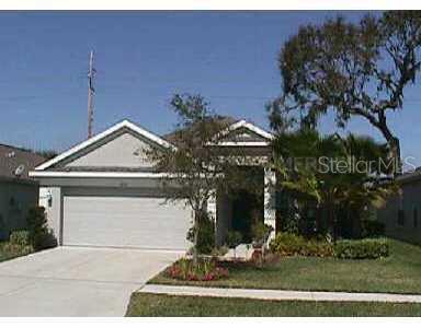 5652 Rockfield Loop Valrico, FL 33596 - Photo 1 of 1 a front view of a house with garden