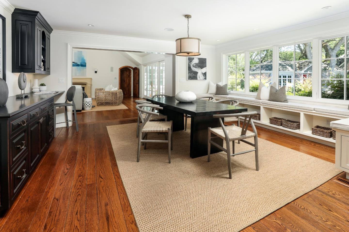 96 Laburnum Road Atherton, CA 94027 - Photo 13 of 40 a dining hall with stainless steel appliances granite countertop a stove a sink dishwasher and a dining table with garden view