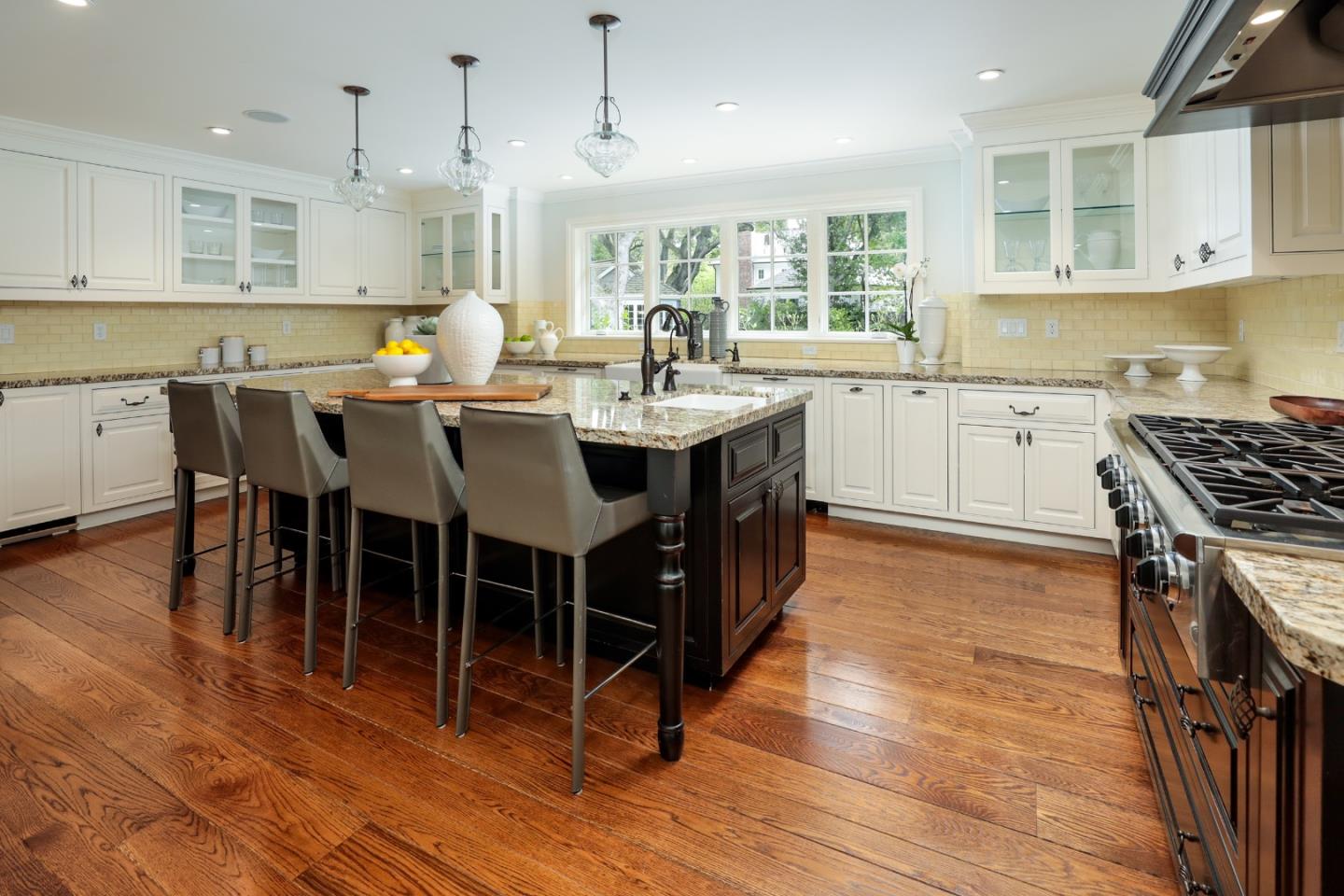 96 Laburnum Road Atherton, CA 94027 - Photo 16 of 40 a large kitchen with lots of counter top space and stainless steel appliances