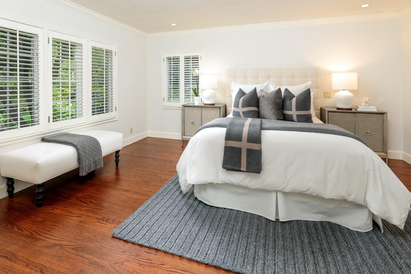 96 Laburnum Road Atherton, CA 94027 - Photo 19 of 40 a bedroom with a bed and wooden floor