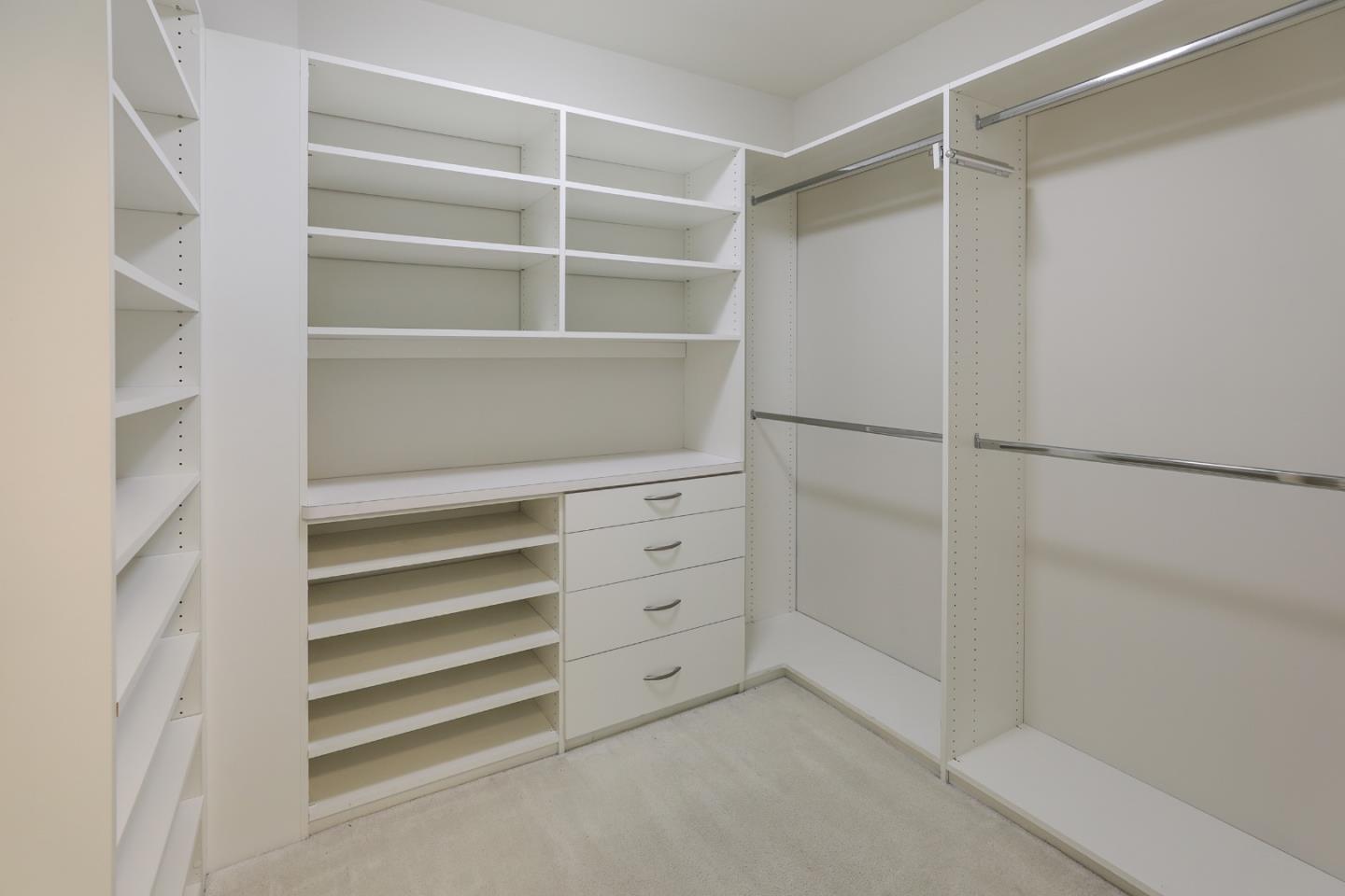 96 Laburnum Road Atherton, CA 94027 - Photo 29 of 40 a view of walk in closet with empty racks