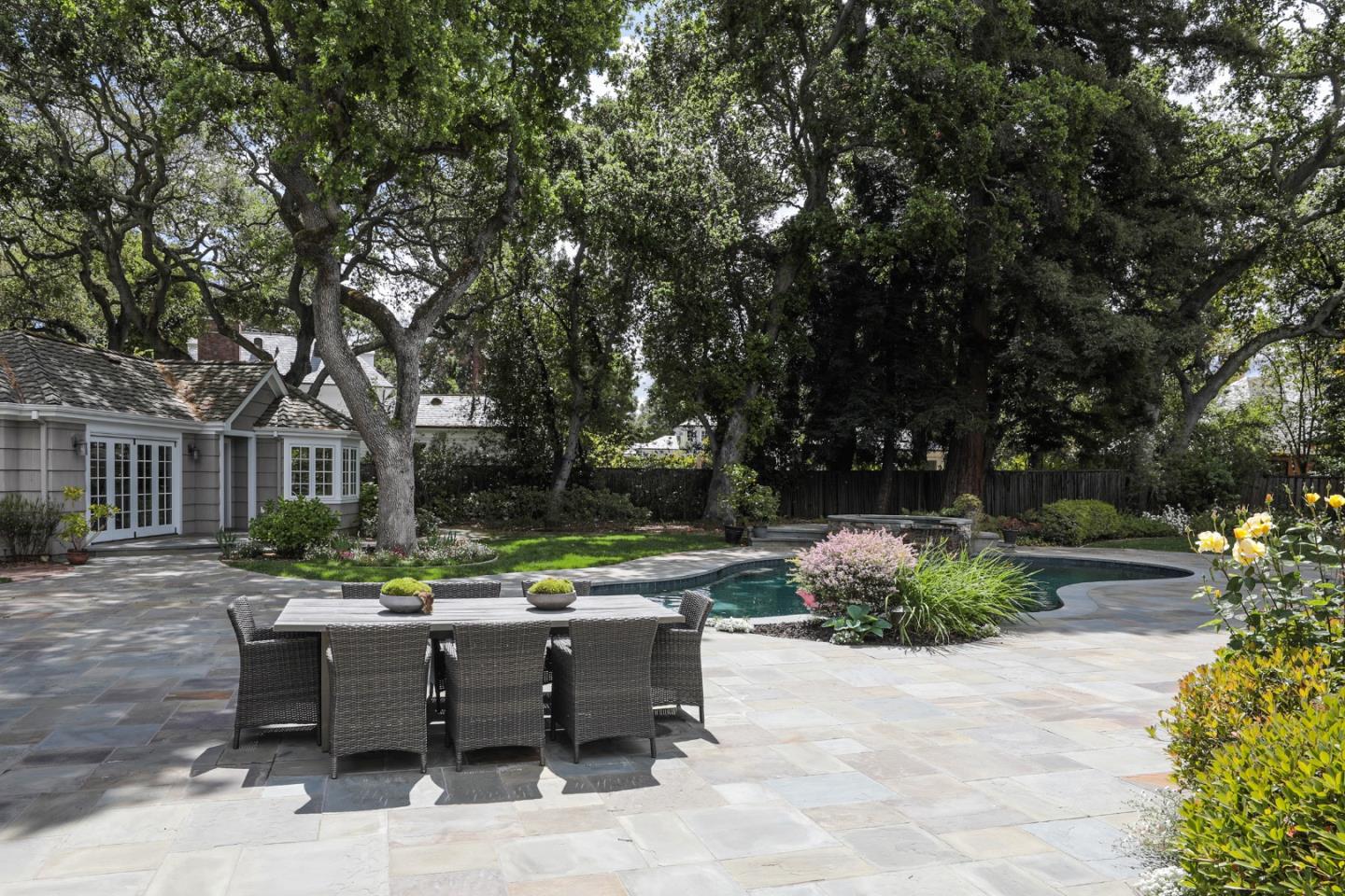 96 Laburnum Road Atherton, CA 94027 - Photo 31 of 40 a view of patio with table and chairs and potted plants