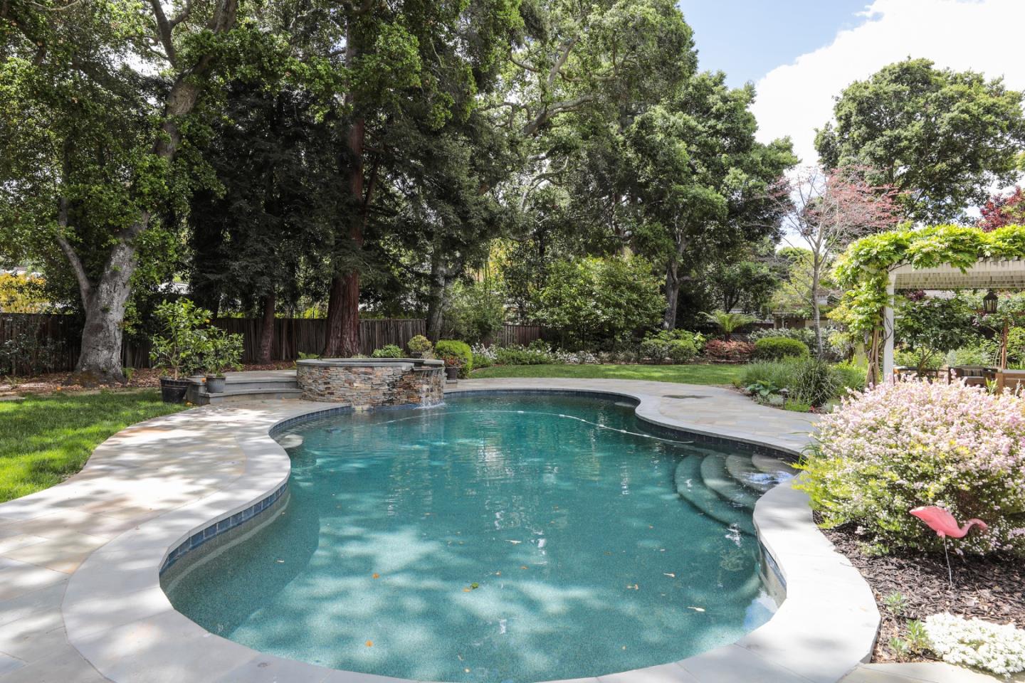 96 Laburnum Road Atherton, CA 94027 - Photo 33 of 40 a view of a swimming pool with a outdoor seating