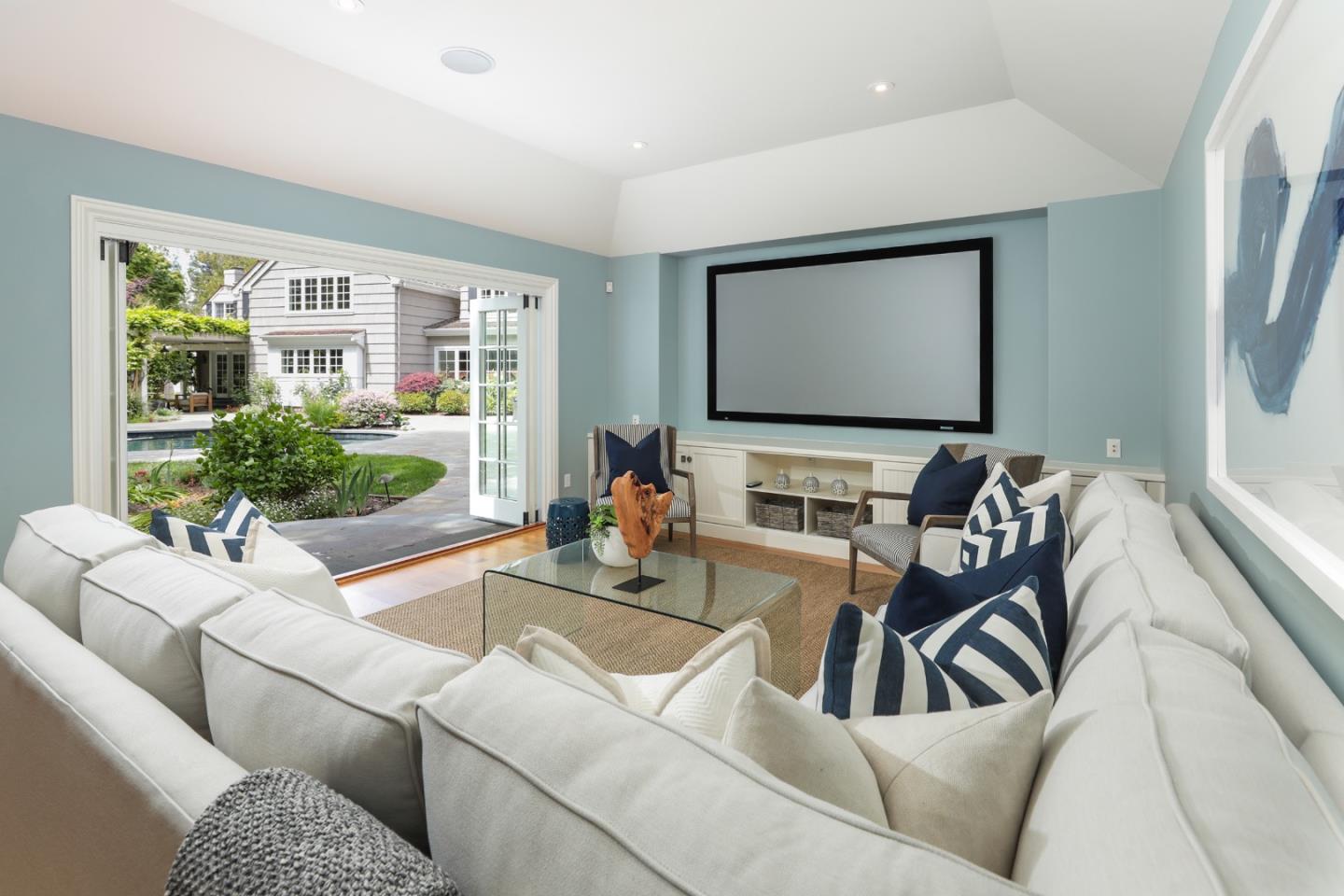96 Laburnum Road Atherton, CA 94027 - Photo 37 of 40 a living room with furniture and a flat screen tv