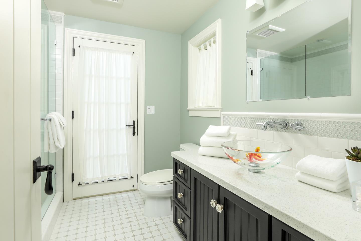 96 Laburnum Road Atherton, CA 94027 - Photo 38 of 40 a bathroom with a sink and a mirror