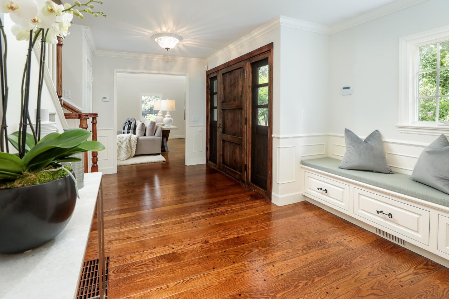 96 Laburnum Road Atherton, CA 94027 - Photo 7 of 40 a hallway with wooden floor and a potted plant