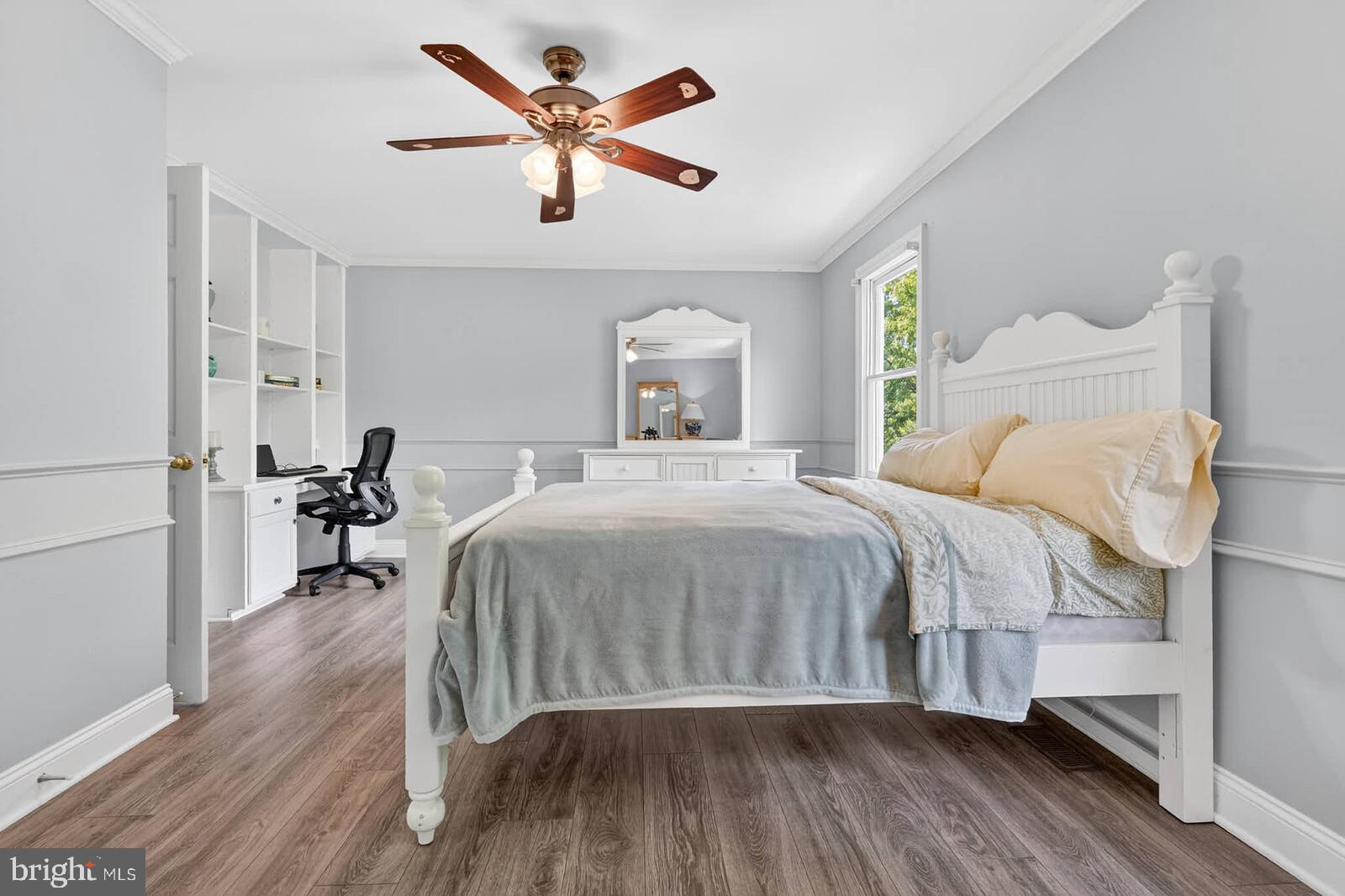 2108 Merrifields Drive Silver Spring, MD 20906 - Photo 34 of 69 a bedroom with a bed and a chandelier