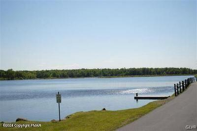 West Ridge Drive Newfoundland, PA 18445 - Photo 8 of 9 a view of a lake with houses in the back