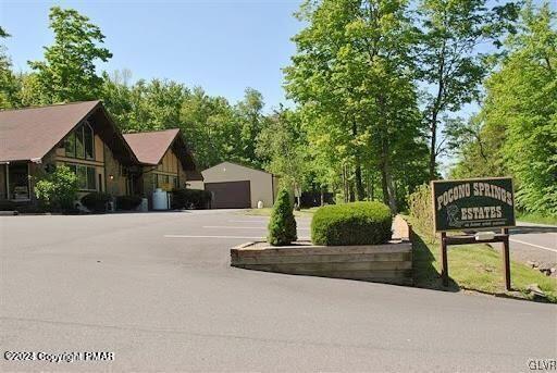 West Ridge Drive Newfoundland, PA 18445 - Photo 9 of 9 a front view of a house with a yard