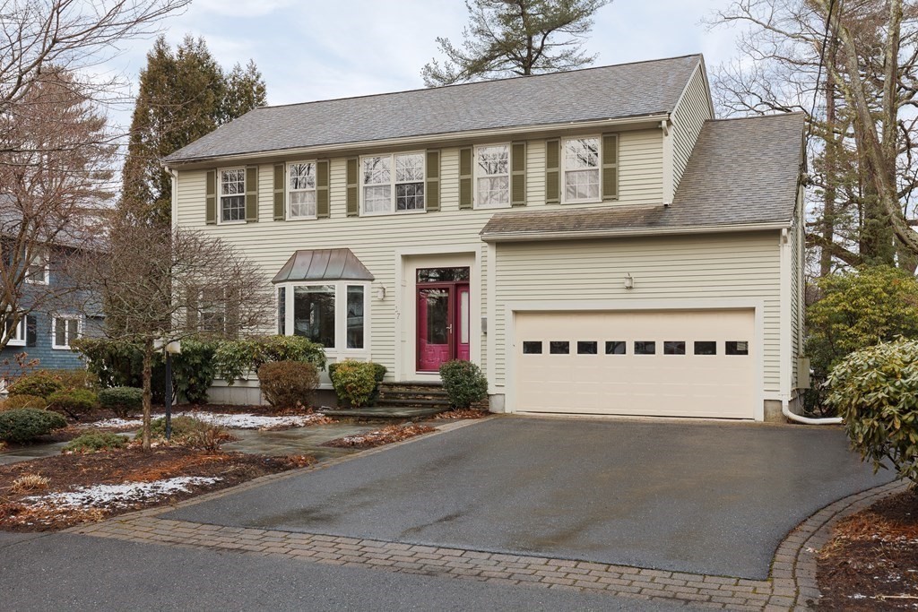 17 Parker Street Lexington, MA 02421 - Photo 1 of 1 a front view of a house with a yard and garage