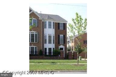 2308 Plyers Mill Road Silver Spring, MD 20902 - Photo 1 of 1 a view of a building with a yard
