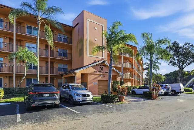 a view of car parked in front of house