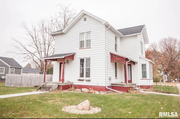 a front view of house with yard