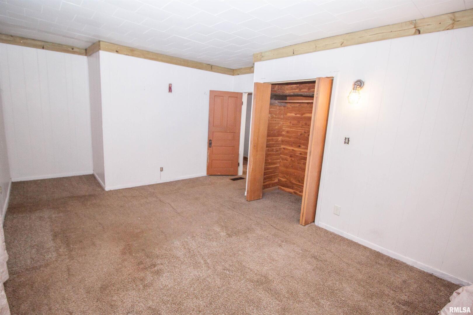 201 North 1st Street Alpha, IL 61413 - Photo 21 of 28 a view of room with walk in closet