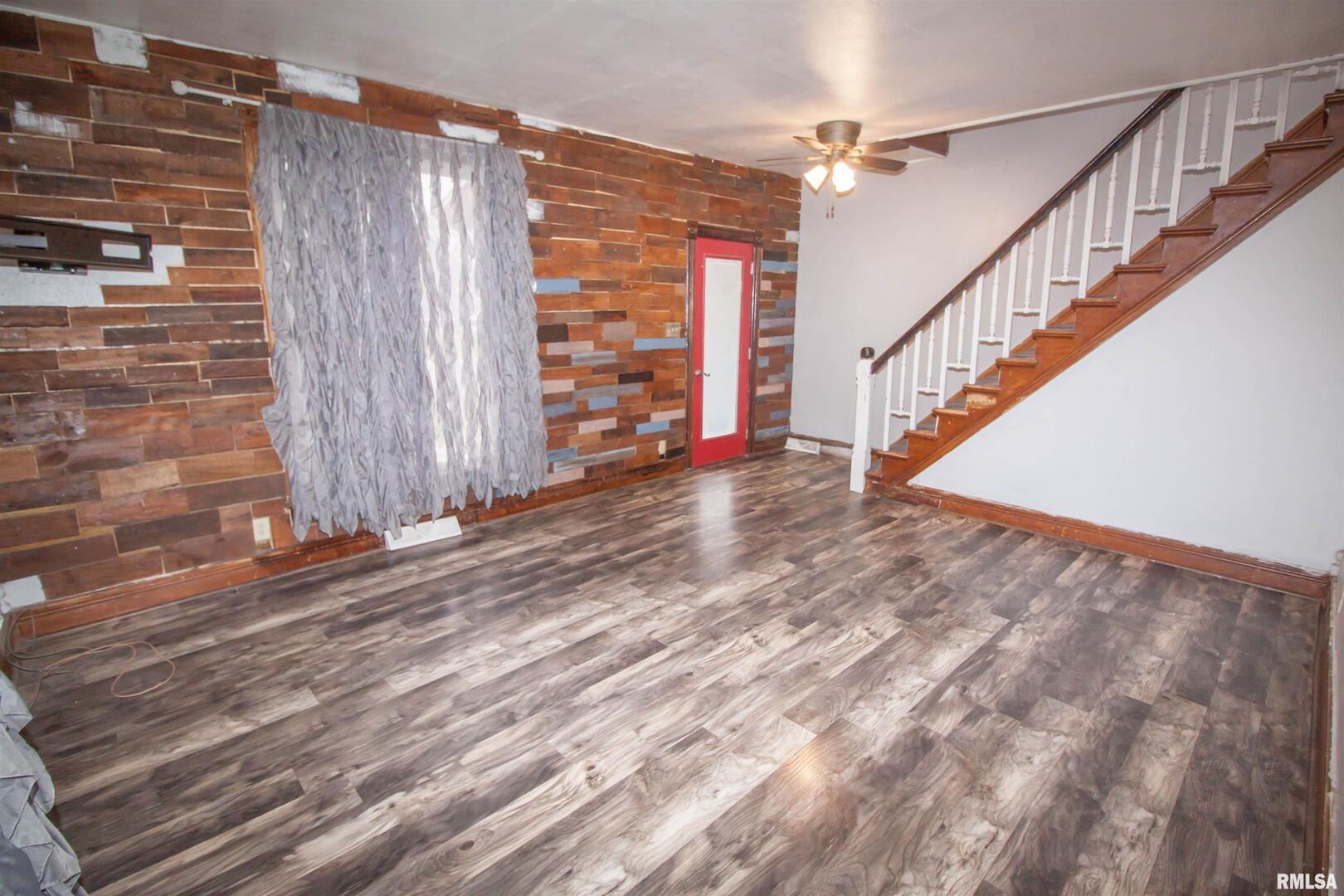 201 North 1st Street Alpha, IL 61413 - Photo 8 of 28 a view of an entryway with wooden floor
