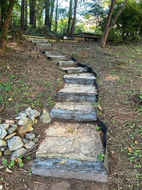 110 Joycetown Church Road Southwest Lenoir, NC 28645 - Photo 11 of 42 a backyard of a house with lots of green space