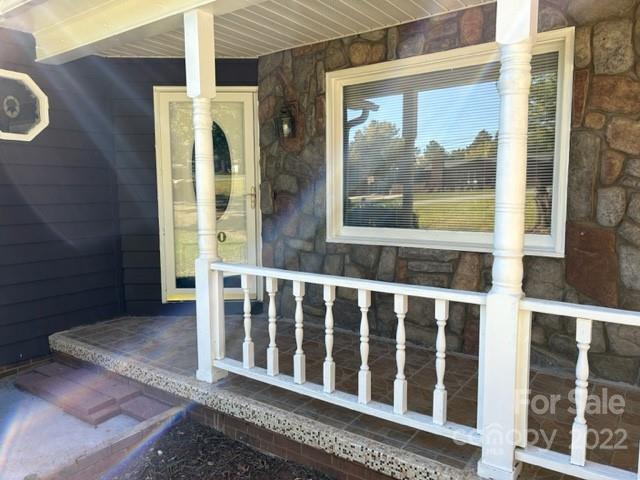 110 Joycetown Church Road Southwest Lenoir, NC 28645 - Photo 12 of 42 a view of a wooden house with a porch