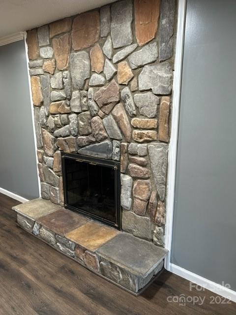 110 Joycetown Church Road Southwest Lenoir, NC 28645 - Photo 16 of 42 a view of empty room with wooden floor and fireplace