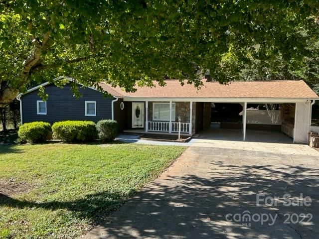 110 Joycetown Church Road Southwest Lenoir, NC 28645 - Photo 2 of 42 a front view of a house with garden