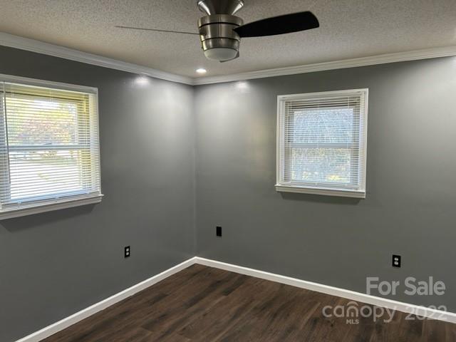 110 Joycetown Church Road Southwest Lenoir, NC 28645 - Photo 30 of 42 a view of an empty room with a window and wooden floor
