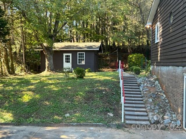 110 Joycetown Church Road Southwest Lenoir, NC 28645 - Photo 4 of 42 a view of a house with backyard