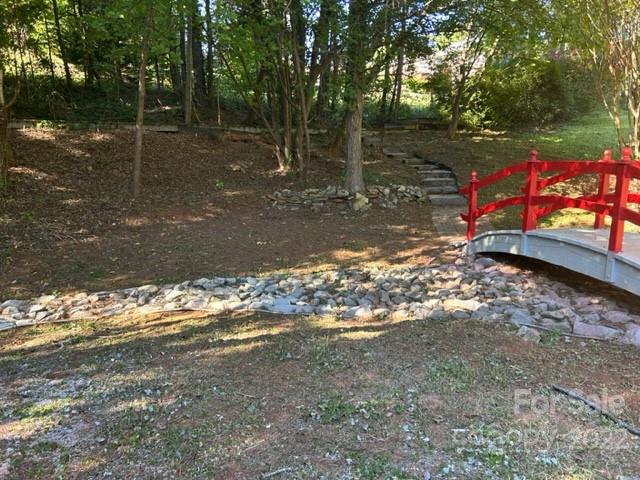 110 Joycetown Church Road Southwest Lenoir, NC 28645 - Photo 10 of 42 a view of a tree in the middle of a yard