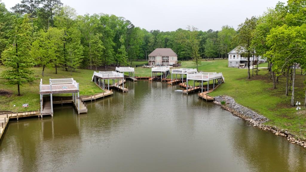 0 Rosemary Lane Cedar Bluff, AL 35959 - Photo 3 of 7 a view of a lake with houses on deck