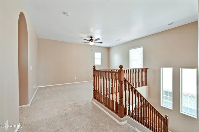 a view of a room with staircase