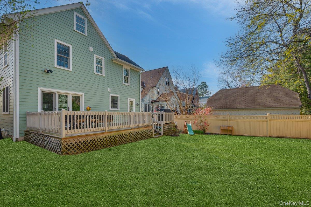 19 Nassau Road Larchmont, NY 10538 - Photo 27 of 40 a front view of house with yard and green space