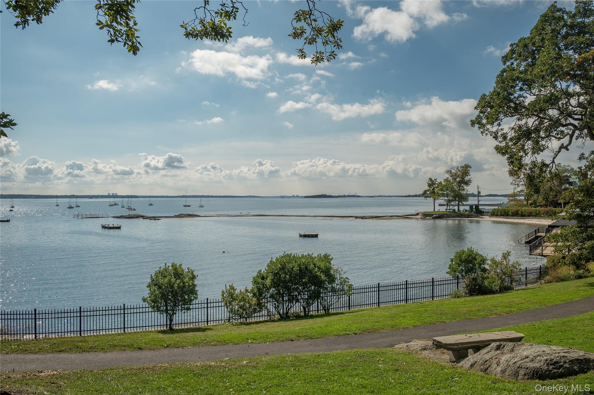19 Nassau Road Larchmont, NY 10538 - Photo 39 of 40 a view of a lake with a big yard