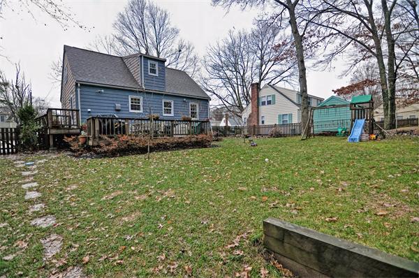 22 Louise Street Canton, MA 02021 - Photo 24 of 26 a front view of a house with a yard