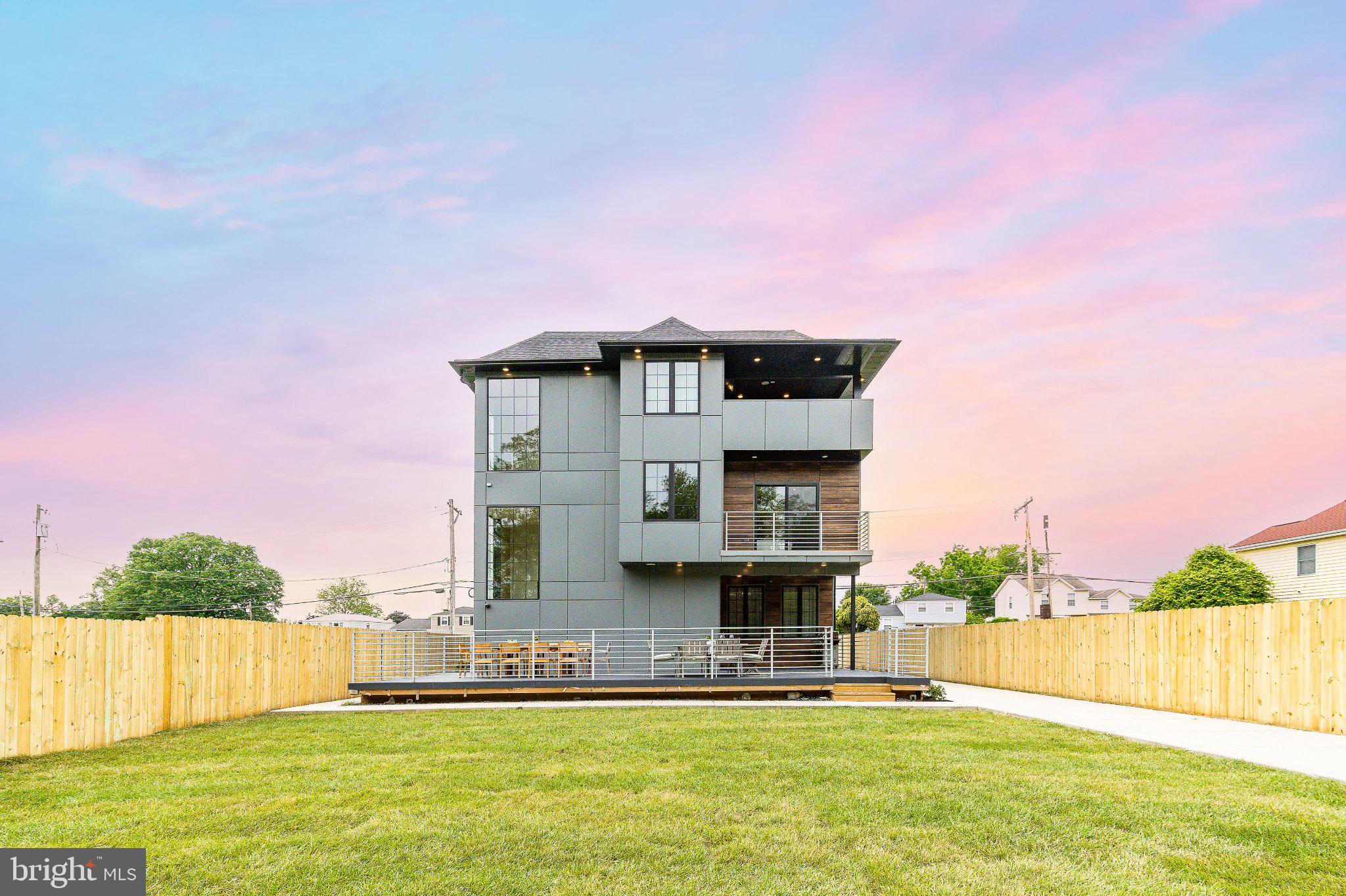 9739 Krewstown Road Philadelphia, PA 19115 - Photo 82 of 84 Modern home with vibrant sunset hues.