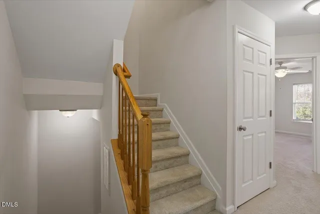 a view of hallway with stairs