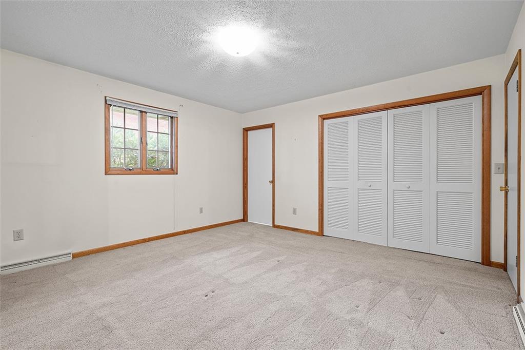 105 Teakwood Road Butler, PA 16001 - Photo 14 of 22 an empty room with windows