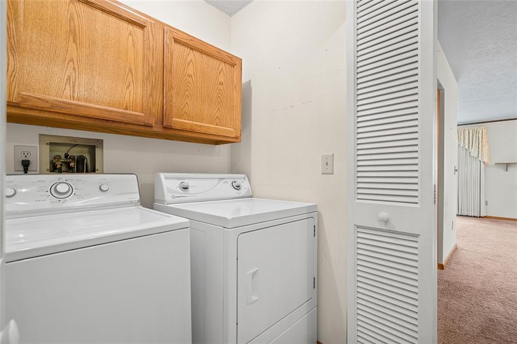 105 Teakwood Road Butler, PA 16001 - Photo 21 of 22 a utility room with dryer and washer