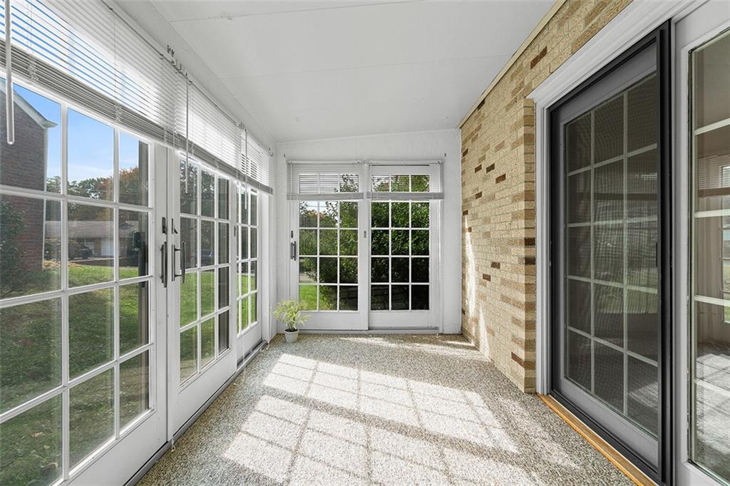105 Teakwood Road Butler, PA 16001 - Photo 6 of 22 a view of empty room with windows