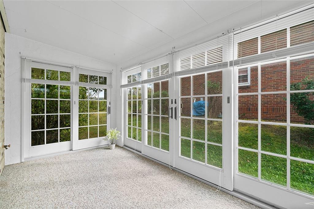 105 Teakwood Road Butler, PA 16001 - Photo 7 of 22 a view of front deck with large windows