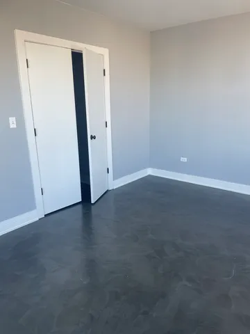 an empty room with a door