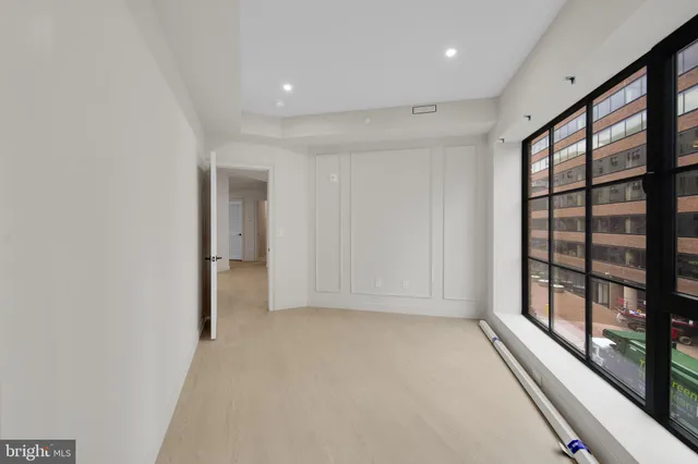 a bathroom with a shower toilet and sink