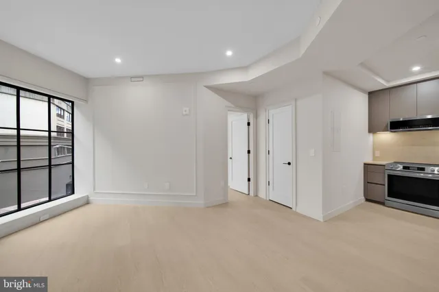 an empty room with windows