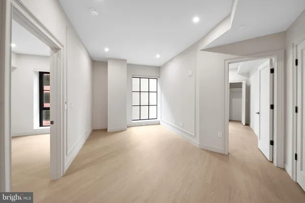 a view of an empty room with a window