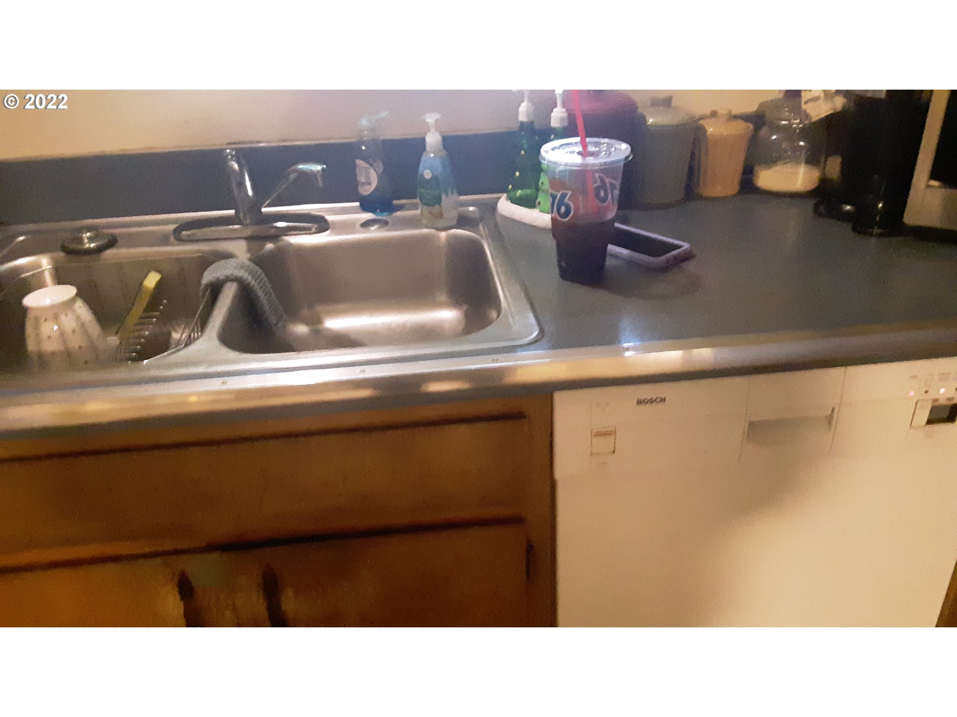 210 North 38th Place Springfield, OR 97478 - Photo 9 of 20 a bathroom with a sink and a mirror