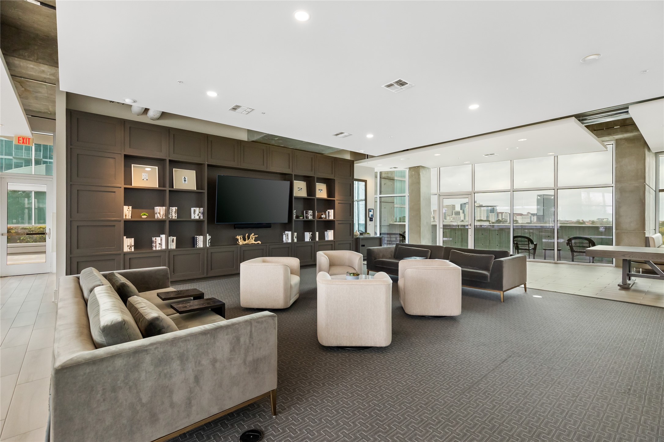 5925 Almeda Road, Unit 11501 Houston, TX 77004 - Photo 25 of 30 a living room with furniture and a flat screen tv