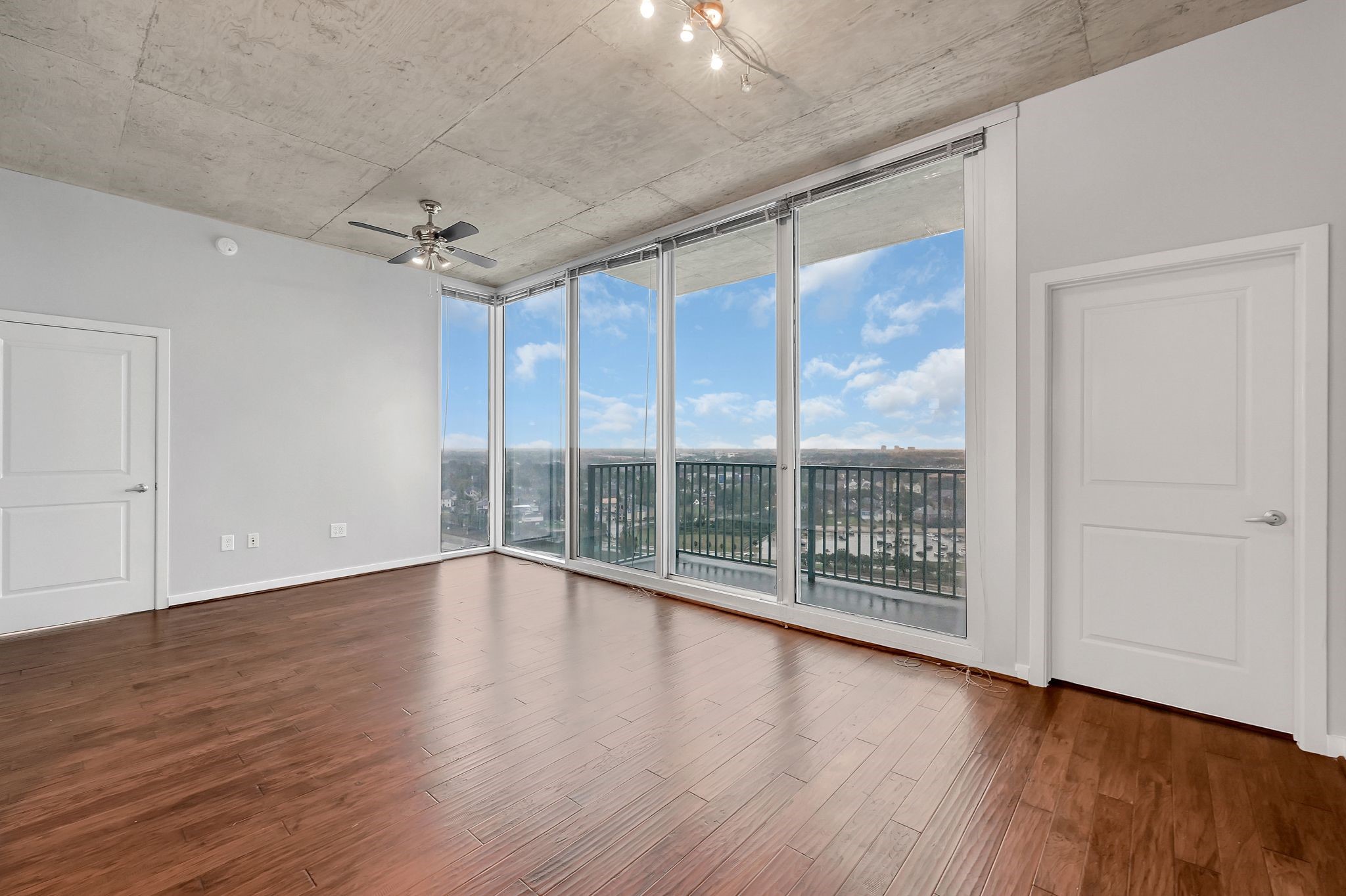 5925 Almeda Road, Unit 11501 Houston, TX 77004 - Photo 3 of 30 wooden floor in an empty room with a window