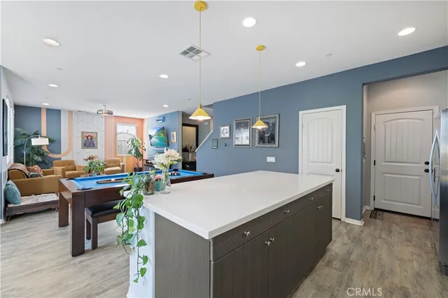 a bathroom with a sink mirror vanity and toilet