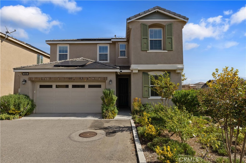 22088 Windham Way Saugus, CA 91350 - Photo 2 of 62 front view of a house with a yard