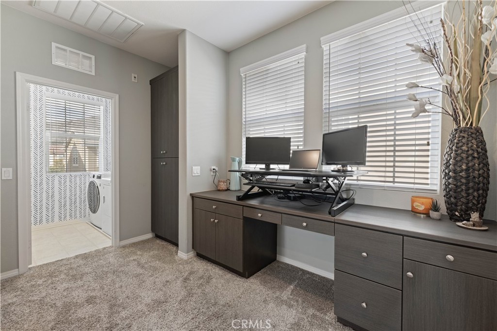 22088 Windham Way Saugus, CA 91350 - Photo 21 of 62 a kitchen with stainless steel appliances stove top oven and cabinets